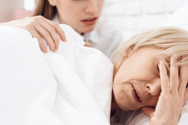 sick old woman has headache her sleep_99043 3669